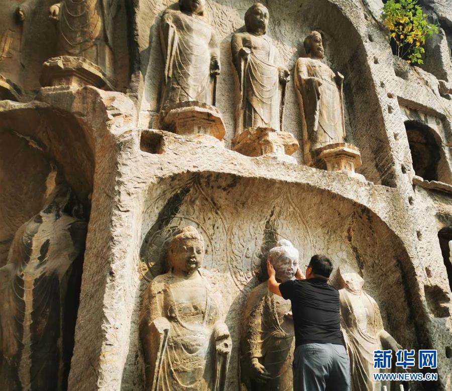 （圖文互動）（4）合體了，龍門石窟流散佛首首次實(shí)現(xiàn)“數(shù)字復(fù)位”
