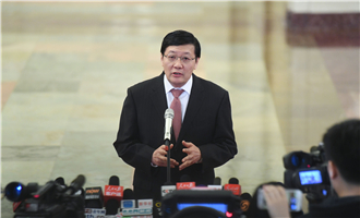 全國社?；鹄硎聲硎麻L樓繼偉接受采訪