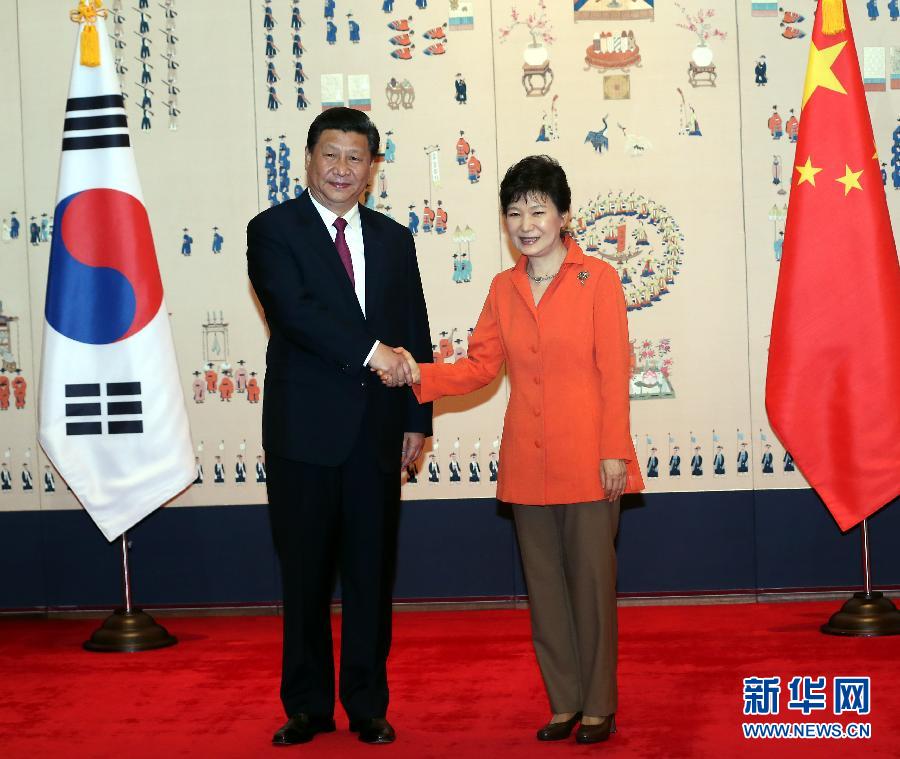 7月3日，國家主席習(xí)近平在首爾同韓國總統(tǒng)樸槿惠舉行會談。新華社記者 蘭紅光 攝