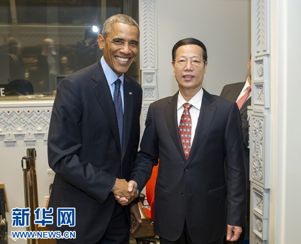 9月23日，國家主席習(xí)近平特使、國務(wù)院副總理張高麗在紐約會見出席聯(lián)合國氣候峰會的美國總統(tǒng)奧巴馬。 新華社記者王曄攝