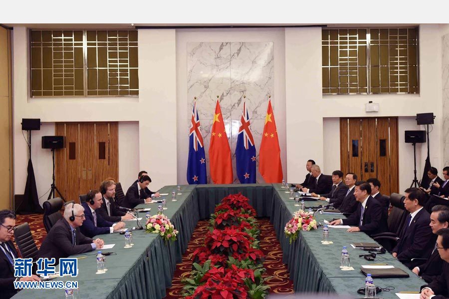 11月18日，國家主席習近平在菲律賓馬尼拉會見新西蘭總理約翰·基。 新華社記者 饒愛民 攝
